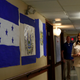 Flag from central American countries hang from the walls at the center for migrant children.